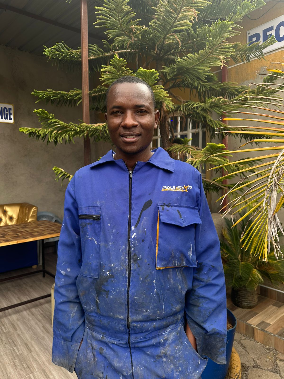 MICHAEL OLUM HEAD OF PAINTING PAULSTAR AUTOCARE GARAGE